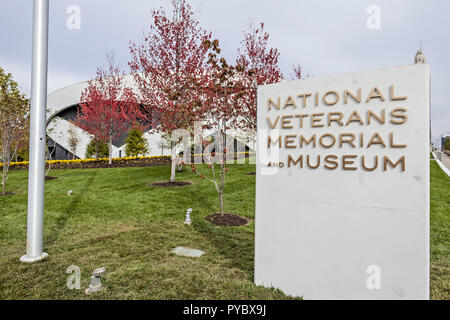 Columbus, Ohio, USA. 25th Oct, 2018. The exterior of the National Veterans Memorial and Museum photographed Thursday, October 25, 2018 in Columbus, Ohio. The NVMM will open officially to the public on Saturday October 26, 2018. Retired Army Gen. Colin L. Powell will deliver a keynote address about the role of veterans in our country and the innovation, courage and strength they provide communities. The new building, designed by U.S.-based Allied Works Architecture, is a sort of concrete cake. Or as the firm describes it, "Intersecting bands of concrete, arranged in concentric rings, give Stock Photo