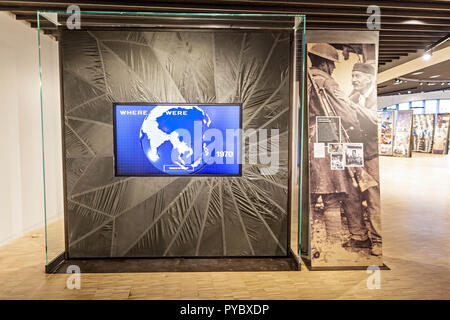 Columbus, Ohio, USA. 25th Oct, 2018. One of the displays at the National Veterans Memorial and Museum photographed Thursday, October 25, 2018 in Columbus, Ohio. The NVMM will open officially to the public on Saturday October 26, 2018. Retired Army Gen. Colin L. Powell will deliver a keynote address about the role of veterans in our country and the innovation, courage and strength they provide communities. The new building, designed by U.S.-based Allied Works Architecture, is a sort of concrete cake. Or as the firm describes it, "Intersecting bands of concrete, arranged in concentric ring Stock Photo