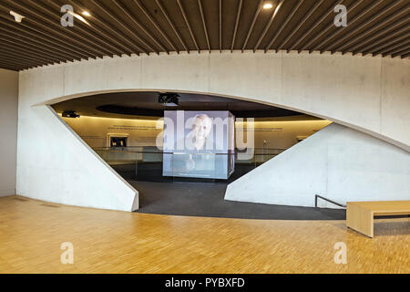 Columbus, Ohio, USA. 25th Oct, 2018. The National Veterans Memorial and Museum photographed Thursday, October 25, 2018 in Columbus, Ohio. The NVMM will open officially to the public on Saturday October 26, 2018. Retired Army Gen. Colin L. Powell will deliver a keynote address about the role of veterans in our country and the innovation, courage and strength they provide communities. The new building, designed by U.S.-based Allied Works Architecture, is a sort of concrete cake. Or as the firm describes it, "Intersecting bands of concrete, arranged in concentric rings, give form to the mus Stock Photo