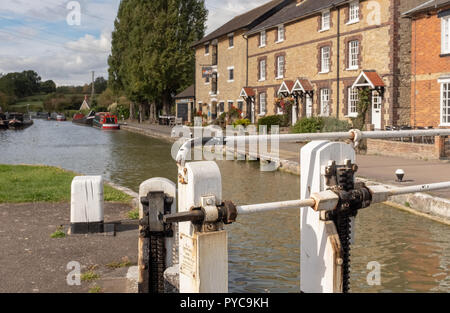 View across canal lock to The Canal Museum at Stoke Bruerne on the Grand Union Canal, Northamptonshire, England Stock Photo