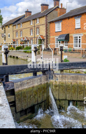 View across canal lock to The Canal Museum at Stoke Bruerne on the Grand Union Canal, Northamptonshire, England Stock Photo