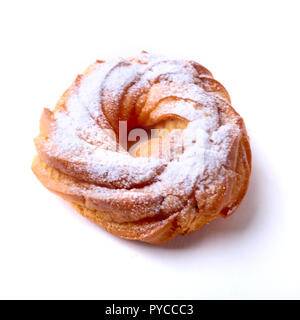 Chocolate and powdered sugar cream puff rings, choux pastry. Isolated on white background. Stock Photo