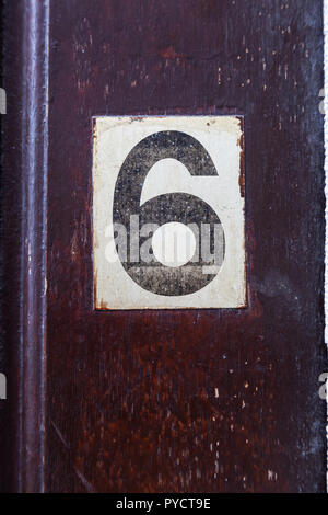 Wooden plate number 6 six on brick wall conceptual image closeup Stock ...