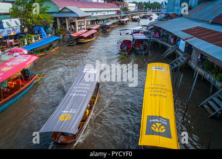 Amphawa, Thailand - Sep 13, 2015: Main canal of Amphawa floating food market, full of boats and small restaurants Stock Photo