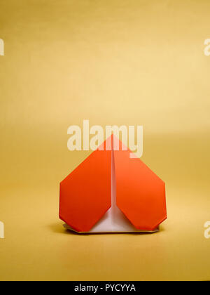 A STILL LIFE OF A PAPER HEART MADE WITH THE ART OF ORIGAMI Stock Photo