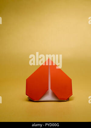 A STILL LIFE OF A PAPER HEART MADE WITH THE ART OF ORIGAMI Stock Photo