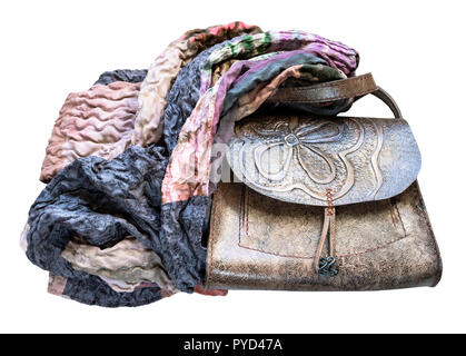 handmade carved leather handbag wrapped of the patchwork scarf cut out on white background Stock Photo