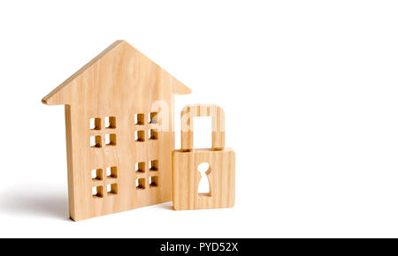 Wooden house padlock. The concept of protection of property and real estate, property rights. Installation of alarm systems and services of security a Stock Photo