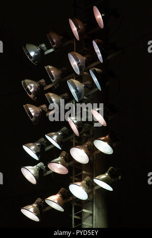 Close up of floodlights at an evening sports event Stock Photo