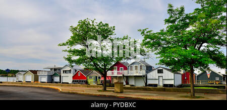 Wooden boat houses (Aquaholicks) along City Pier, Canandaigua Lake, one of the Finger Lakes, NY, USA Stock Photo