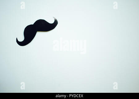 Paper Mustache on light blue background, Prostate cancer awareness , Men health awareness month, copy space Stock Photo
