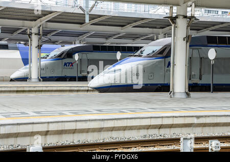 KTX Trains, Korea's fast, express inter-city trains sit and wait to depart from Seoul Railway Station in Seoul, South Korea. Stock Photo