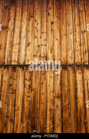 Vintage wood background, vertical planks, old wooden wall from 17th century chapel. Stock Photo