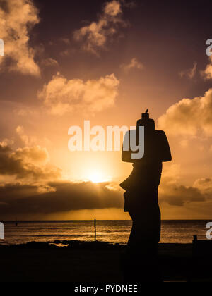Moai shilouette during the sunset in Easter Island, Chile, South America. Hanga Roa city Stock Photo