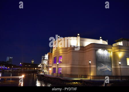 Orlando, Florida. October 11, 2018. Italian Restaurant with vintage Trans Global Airlines sign and purple iluminated windows at Lake Buena Vista Area. Stock Photo