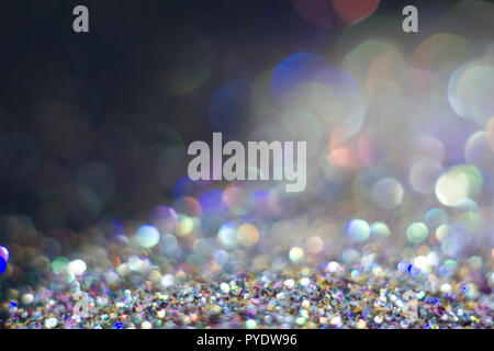 Abstraction colorful bokeh on a dark background. Defocused. Free space for text. Stock Photo