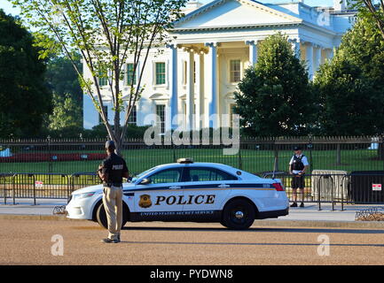 Washington, DC USA. Jul 2016. Uniformed Secret Service Capitol Police patrolling one of the side roads around the White House. Stock Photo