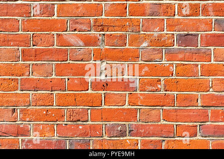 Background from a well saturated orange brickwall Stock Photo