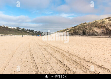 Crantock Beach in Newquay in Cornwall - TRyre marks in the sand. Stock Photo