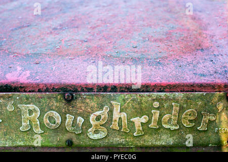 Roughrider trademark name on the back of an old Liner Concrete Machinery Company mini dump truck Stock Photo