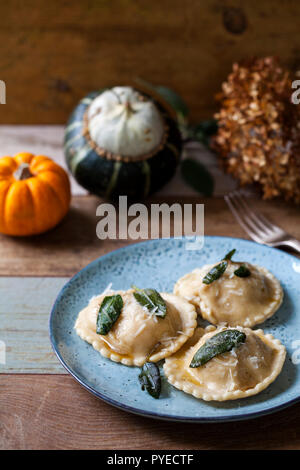 Pumpkin and ricotta ravioli with crispy sage, burnt butter sauce and ...