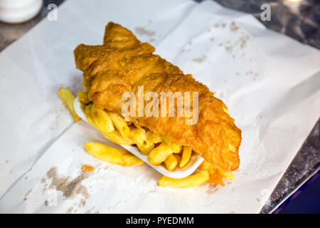 Traditional English dish - fish and chips at The Fish Plaice in Swanage, Jurassic Coast, UK Stock Photo