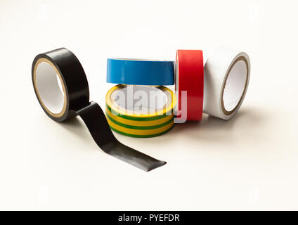 Multicolored insulating tape on a white background, close-up Stock Photo