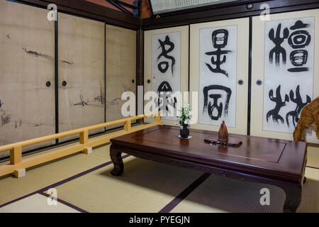 Famous Genko-an Temple with window of enlightenment and window of illusion at autumn day, Kyoto, Kansai, Japan Stock Photo