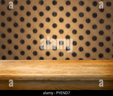 Empty checkered table and wall with black dots. Stock Photo
