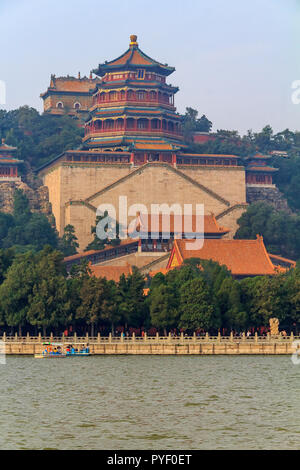 Longevity Hill and Summer Palace viewed from Kunming Lake with a heavy smog in the sky in Beijing, China Stock Photo