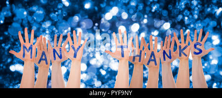 Hands Building Many Thanks, Glittering And Sparkling Bokeh Background Stock Photo