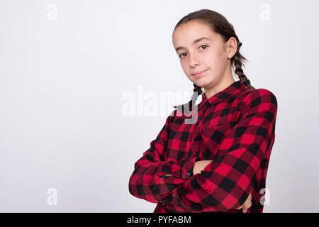 little girl posing with arms crossed Stock Photo