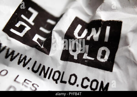 Uniqlo logo from crumpled receipt, close-up Stock Photo