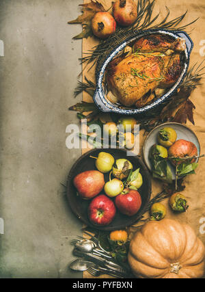 Thanksgiving dinner table top view, copy space, vertical composition Stock Photo