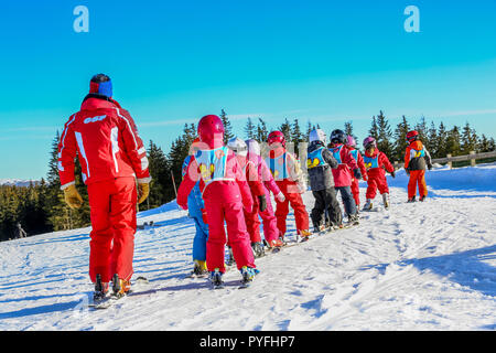 GERARDMER, FRANCE - FEB 20 - French children form ski school groups during the annual winter school holiday on Feb 20, 2015 in Gerardmer, France. Stock Photo