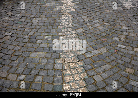 Memorial in Munich old city center. Gold pathway marked out on the paving stones Stock Photo