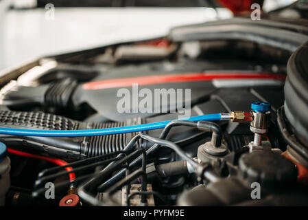 Connected air conditioning system for diagnosis of freon in the car conditioner Stock Photo