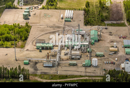 The Ferrier Gas Plant is a refrigerated lean oil absorption processing facility which receives sweet rich gas from local area wells. Stock Photo