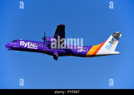 flybe ATR 72 -600 EI-FMJ airliner plane taking off in blue sky from London Southend Airport. Stobart Air operation Stock Photo