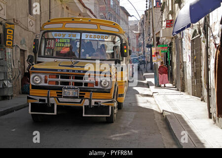 2 June 2016, - La Paz, Bolivia: A bus works its way through the narrow streets of La Paz, Bolivia, on a sunny day. Stock Photo