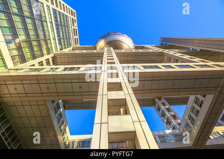 Tokyo, Japan - April 19, 2017: sprospective view of Fuji Television Building and Observatory in Odaiba, Minato district. Fuji TV headquarters is known for its bizarre and futuristic architecture. Stock Photo