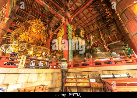 Nara, Japan - April 26, 2017: the Great Buddha or Daibutsu, the world's largest bronze statue of Buddha Vairocana, in the Great Buddha Hall of Todai-ji a Buddhist temple in Nara. UNESCO Heritage Site. Stock Photo