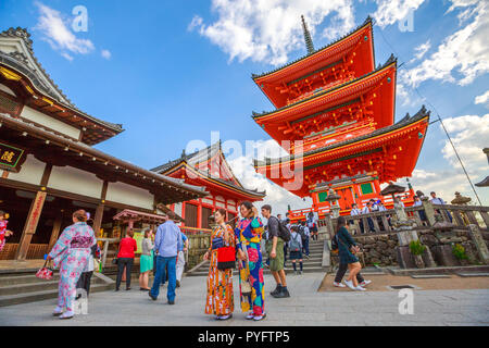 Kyoto, Japan - April 24, 2017: people and women in traditional japanese kimonos walking inside Kiyomizu-dera, Southern Higashiyama, one of the most celebrated temples of Japan. Unesco heritage Site. Stock Photo