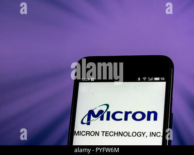 Micron Technology Corporation  logo seen displayed on smart phone. Micron Technology, Inc. is an American global corporation. The company produces many forms of semiconductor devices, including dynamic random-access memory, flash memory, and solid-state drives. Its consumer products are marketed under the brands Crucial and Ballistix. Stock Photo
