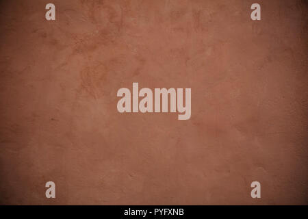 Brown stucco painted wall texture and grunge background Stock Photo