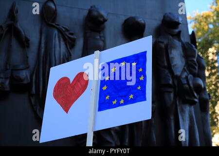 London, UK -20, October 2018:Placard with a European symbol and red heart next to Monument to the Women of World War II, London Stock Photo