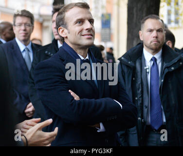 Prague, Czech Republic. 27th Oct, 2018. French President Emmanuel Macron (center) is seen in front of the French Embassy in Prague, Czech Republic, on October 27, 2018. Credit: Michaela Rihova/CTK Photo/Alamy Live News Stock Photo