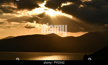 Nafplion, Greece. 27th October 2018. The sun sets in the city of Nafplion and makes toys with clouds creating an idyllic atmosphere, Saturday, 27 October 2018. Credit: VANGELIS BOUGIOTIS/Alamy Live News Stock Photo