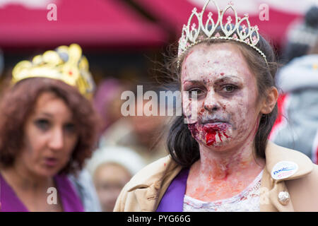 Poole, Dorset, UK. 27th October 2018. Poole's first ever zombie festival, a spook-tacular event and parade with prize for worst dress zombie. Crowds turn out on a really cold, but dry, day to take part or watch the chilling event. Credit: Carolyn Jenkins/Alamy Live News Stock Photo