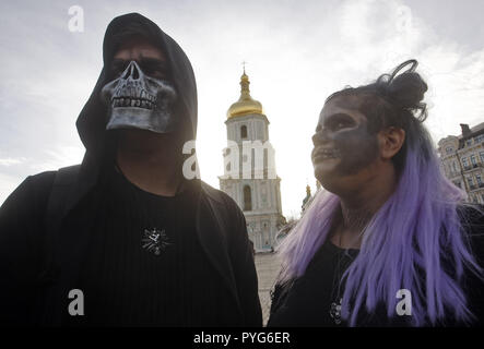 Kiev, Kiev, Ukraine. 27th Oct, 2018. People are seen dressed in zombie costumes and make-up during the celebrations.Hundreds of people marched through the streets in Kiev downtown, on the eve of the Halloween zombie celebrations. Credit: Pavlo Gonchar/SOPA Images/ZUMA Wire/Alamy Live News Stock Photo